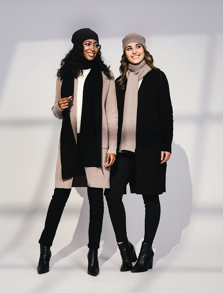 two women in black winter fashion