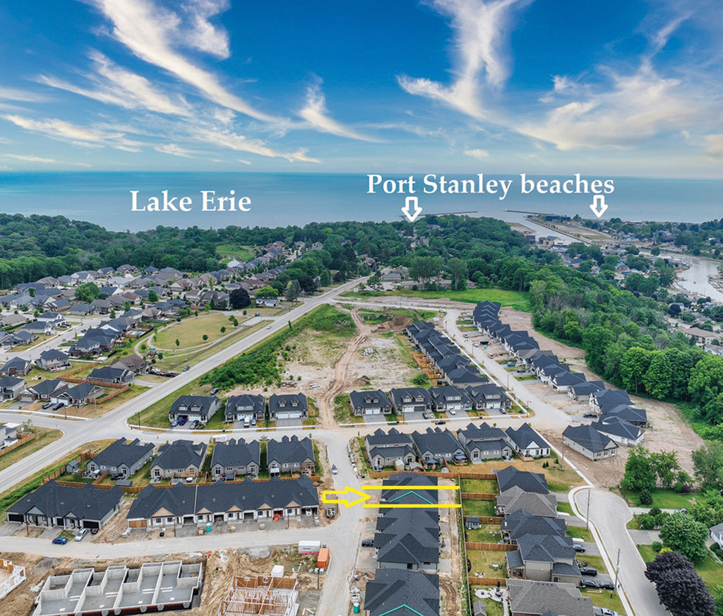 aerial view of subdivision and lake