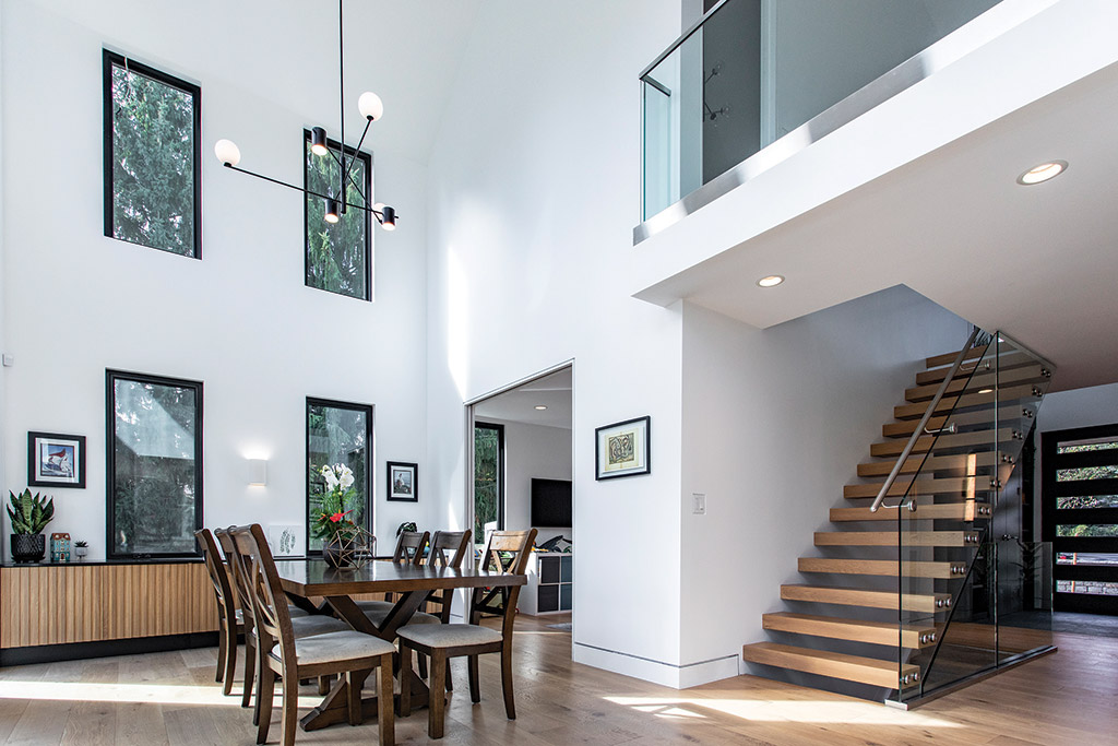 open concept dining area with staircase